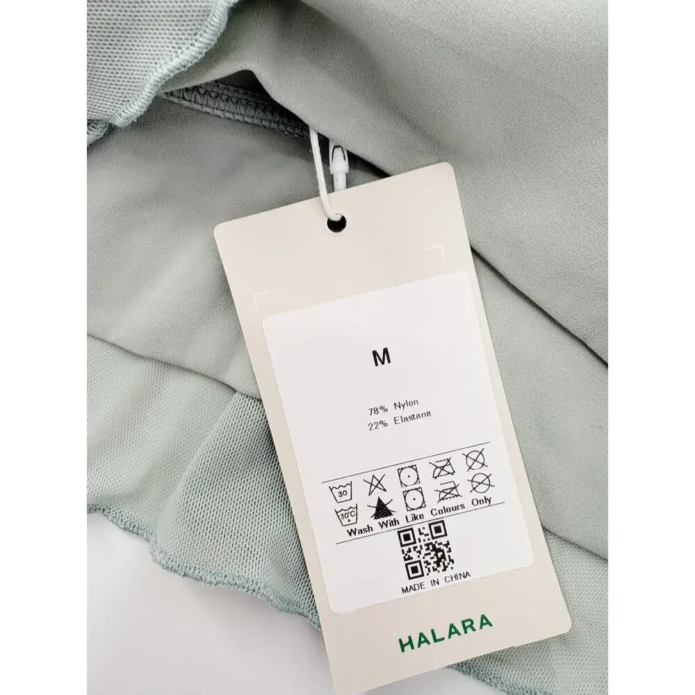 HALARA Sports Bra Size M NEW Mint Green Mesh Ruffle Criss Cross Back